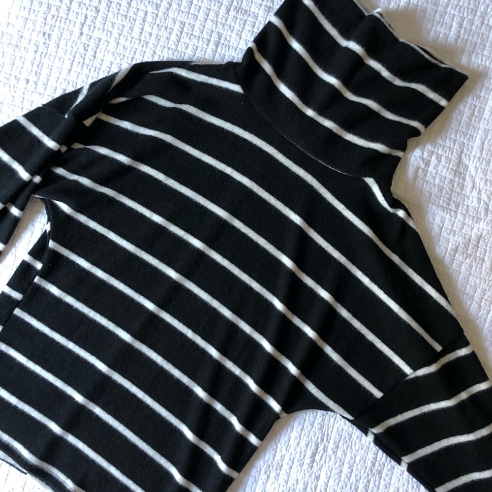 Black striped turtleneck.